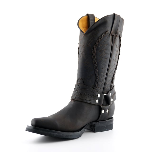 These calf length boots feature a decorative weaved pattern which is stitched onto the upper panel giving this piece a great distinctive character. Additionally, the boot features a sophisticated pointed two as well as 1.5” heels and an additional two pull loops at the sides for easy slip on. This boot was manufactured with a grippy rubber outsole, that has been heat bonded to the welt using the Goodyear method, which is known for increasing the strength of the boot and ensuring durability for years to come. The sole is also fitted with a unique air cushion that allows for added flexibility and which adds to the long-lasting qualities of this boot. • Goodyear Welted • Leather upper • Two pull loops to sides for easy slip on • Luxurious interior leather lining • Rubber Soles • Made in Mexico