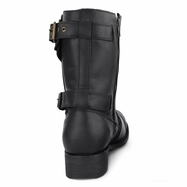 This cowboy style boot appears with a pointed toe, as well as a zip closure with buckles above the heel and at the start of the boot leg for secure fastening. This boot was manufactured with a Grinders proprietary sole unit, that has been heat bonded to the welt using the Goodyear method, which is known for increasing the strength of the boot and ensuring durability for years to come. The sole is also fitted with a unique air cushion that allows for added flexibility and which adds to the long-lasting qualities of this boot. Complete with a comfortable leather interior and exterior this high leg boot is a great piece for adding a stylish touch to your footwear. • Goodyear Welted • High leg silhouette with zip closure • Features stacked heels • Leather upper • Soft Leather lining • Rubber/Leather Soles • Made in Mexico
