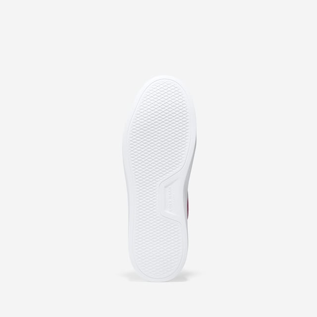 We've given our much-loved, signature GrandPro Rally Court Sneaker an update in organic canvas. Crafted from high-end-yet-durable materials, it features a luxuriously cushioned GRANDFOAM footbed, an EVA outsole, and a classic old-school sneaker vibe