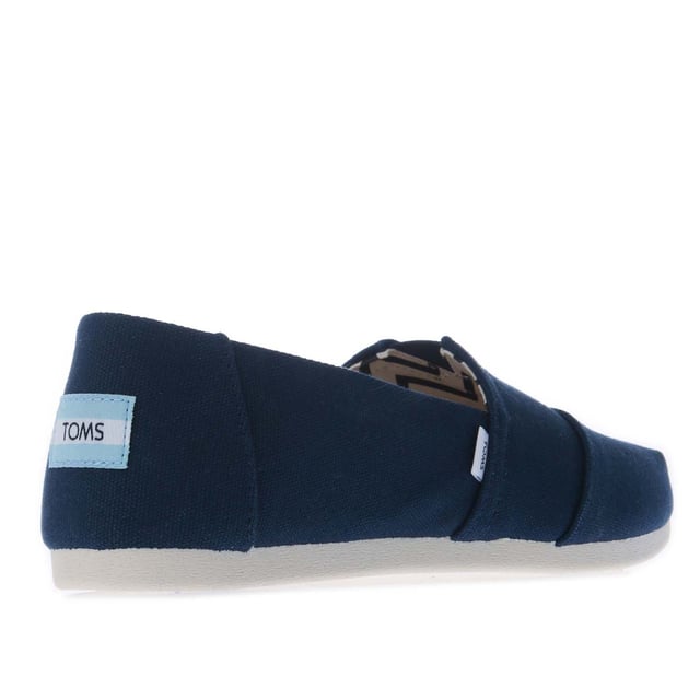Womens Toms Recycled Cotton Canvas Alpargata Espadrille Pumps in navy.- Recycled cotton upper  lining and sock-liner made with 50% recycled cotton.- Classic Alpargata design.- Toe-stitch and elastic V for easy on and off.- Chevron patterned canvas lining.- Custom insoles made with 50% eco content including recycled PU foam.- Direct injection outsole for flexibility and durability with tread pattern for improved traction.- Toms branding to side and back of heel.- 100% vegan construction.- Textile upper  Textile lining  Synthetic and textile sole.- Ref:10017712