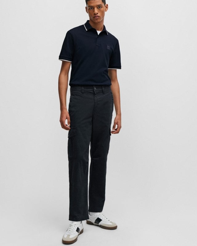 A slim-fitting polo shirt in stretch piqué by BOSS Menswear, trimmed with a logo patch at the left chest.    
Slim fitNeckline: Polo collarNumber of buttons: 3Short sleeves
95% Cotton, 5% Elastane
50507699
 