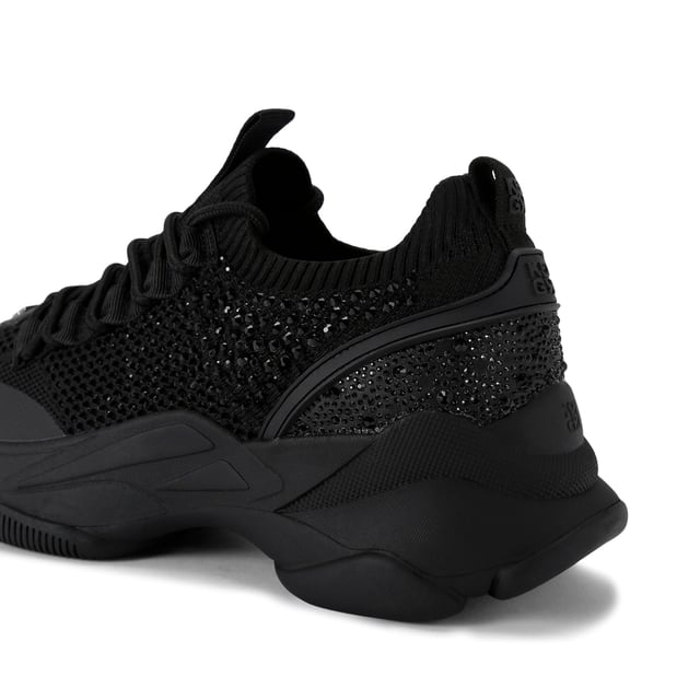 This KG Kurt Geiger Lively Gem sneaker is a black knitted sneaker which is embellished with black crystals. There is gunmetal branding across the upper and embossed branding on the heel.