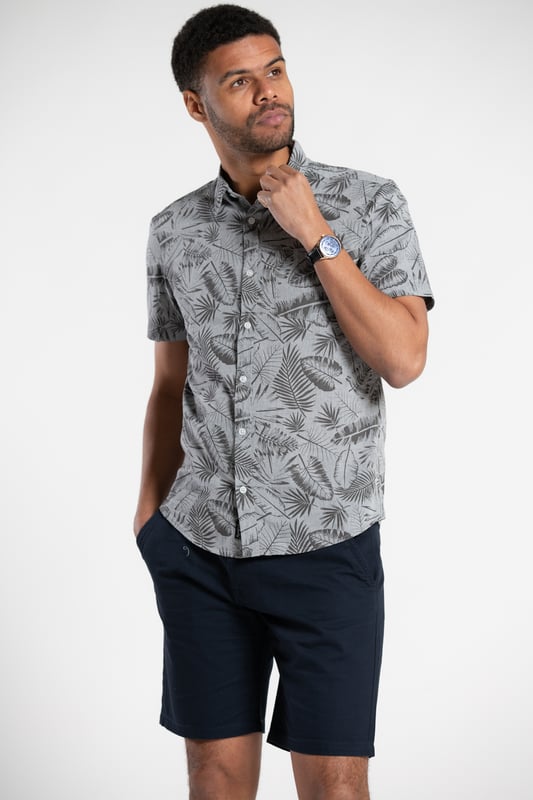 Brighten up your wardrobe with this printed chambray shirt from Tokyo Laundry. Made from 100% cotton, this short-sleeved button-down is perfect for any occasion. The funky design features a comfortable fit, and stylish look. Add this versatile staple to your wardrobe today. Machine washable for easy care.