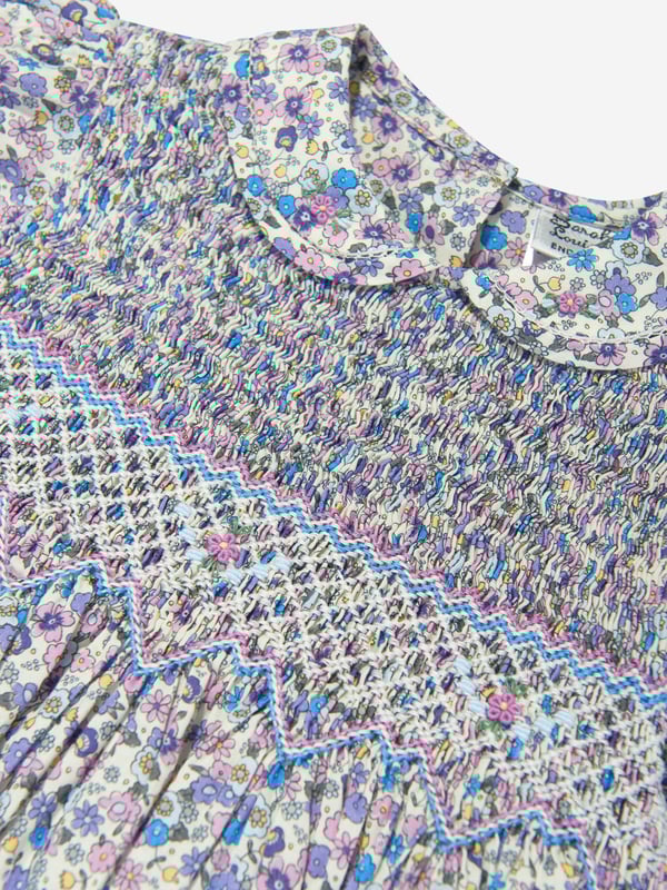 Sarah Louise's intricate precision of beauty and excellent craftsmanship is spellbinding. This girls cotton flower dress in purple captures the label's preference for tradition with an innovative twist. Envisioned with all-over periwinkle floral printing, a stitched bodice via a zigzag border, Peter Pan collar and a belted waist.* Exclusive to Childsplay Clothing Button Fastening Short Puffy Sleeves Flared Skirt Flared Hem Fabric 100%
