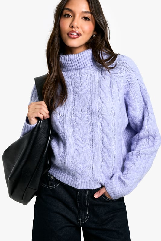 Roll out in a roll neck jumper this season and gives that essential autumn uniform a cosy upgrade. If you want a fitted jumper with a high rolled collar which covers most of the neck, this is the collection for you. Warm, cosy and great for layering, slip into a chunky turtleneck jumper for days when you really want to keep the chill out. Hoping to cause a storm on the social calendar? Get brunch ready in bold roll necks, side split options and balloon sleeves something a little extra. Time not on your side? Grab your fave gilet and throw it over a classic black roll neck jumper. The high collar can be folded or rolled up to compliment your look. One thing's for sure casual and comfortable never looked so good.Style: JumperFabric: AcrylicLength: RegularNeckline: Roll NeckSleeve Length: Long Sleeve