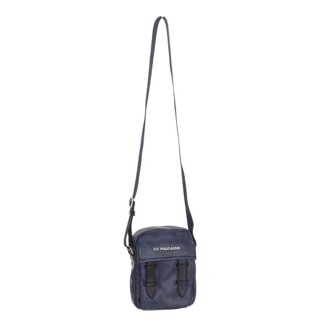 Men's shoulder bag from the U.S. POLO ASSN brand.
 Synthetic material exterior.
 Top zipper closure.
 Front exterior: One pocket with magnet closure.
 Rear exterior: One zipper pocket.
 Front interior: One open pocket.
 Back interior: One zipper pocket.
 Adjustable strap.
 Interior lining with brand print.
 Brand logo on the front.
 Measures: 18x23x6cm
 Composition: 100% Polyurethane
 Care:
Clean with a wet cloth.