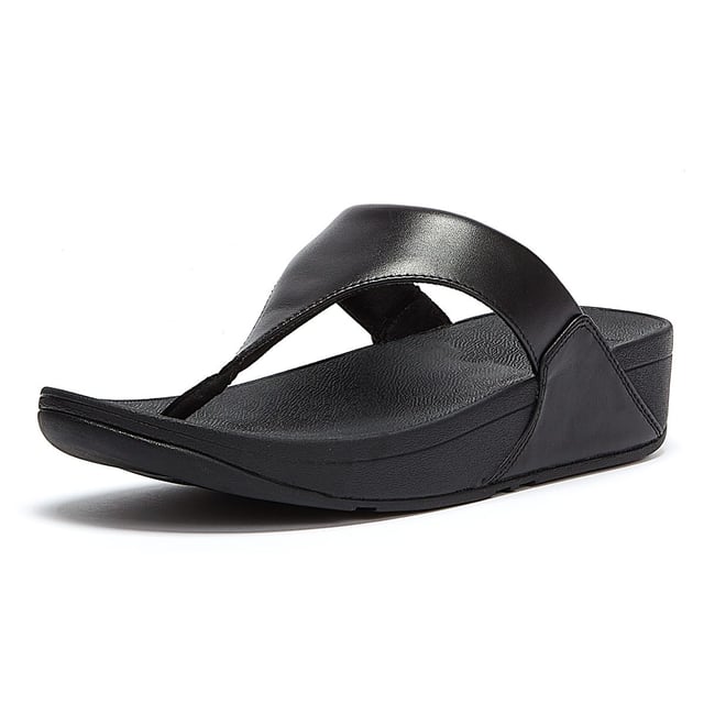 FitFlop Dames Lulu™ Sandalen - (Zwart) De Lulu™ sandalen van FitFlop zijn perfect voor het strand en de zomer. Slip on sandalen met leren bovenwerk en een Microwobbleboard™ tussenzool met driedubbele dichtheid die extra comfort biedt van schokabsorptie tot drukverspreiding. - APMA (American Podiatric Medical Association) Seal Of Acceptance om een goede voetgezondheid te bevorderen - Naadloos ingebouwd voetboogcontour - Slipbestendige rubberen buitenzool