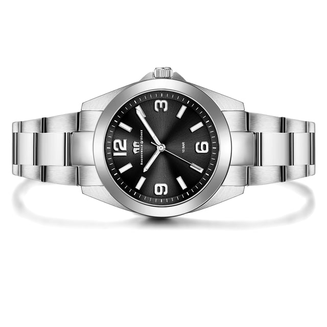 Are you looking for a watch with a timeless design in connection with your own character and excellent quality? Then this timepiece of the Rhodenwald & Sons brand is the perfect choice. The clock manufacturer stands for stylish and sustainable masterpieces for all generations: the women's watch inspires with a tidy dial, minimalist line indices, Arabic numbers, minute and luminiscant staff. The robust stainless steel housing and a suitable link strap made of stainless steel form an exciting contrast to the dark dial and fit harmoniously into the overall concept. A long-lasting quartz clock, a screwed housing floor and waterproof up to 10 ATM complete the exclusive equipment.
