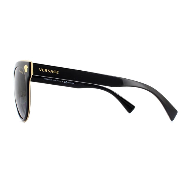 Versace Sunglasses VE2198 1002T3 Black Grey are a chunky cat-eye style crafted from acetate. The outer edge of the frame front is trimmed with metal to match the Medusa head logos found at each corner and the Versace text logo on each temple. Adjustable nose pads guarantee a customised fit for comfort.