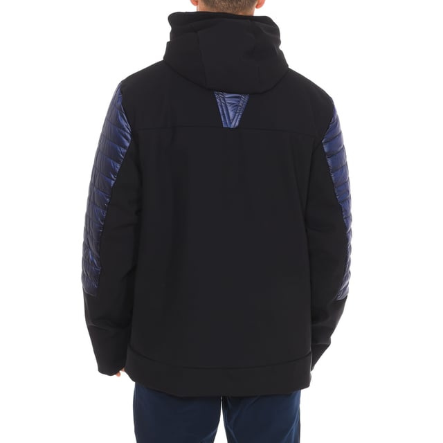Waterproof jacket Vuarnet.
 High collar with hood.
 Zipper closure.
 One zipper pocket on each front side.
 One internal zipper pocket.
 Brand logo on the upper front side.
 Seams seen in tone.
 Composition: 80% Polyamide, 20% Elastane
 Care:
Wash at maximum temperature 30º.
 Iron at low temperature.
 Do not use dryer.
 Do not use bleach.
 Do not dry clean.