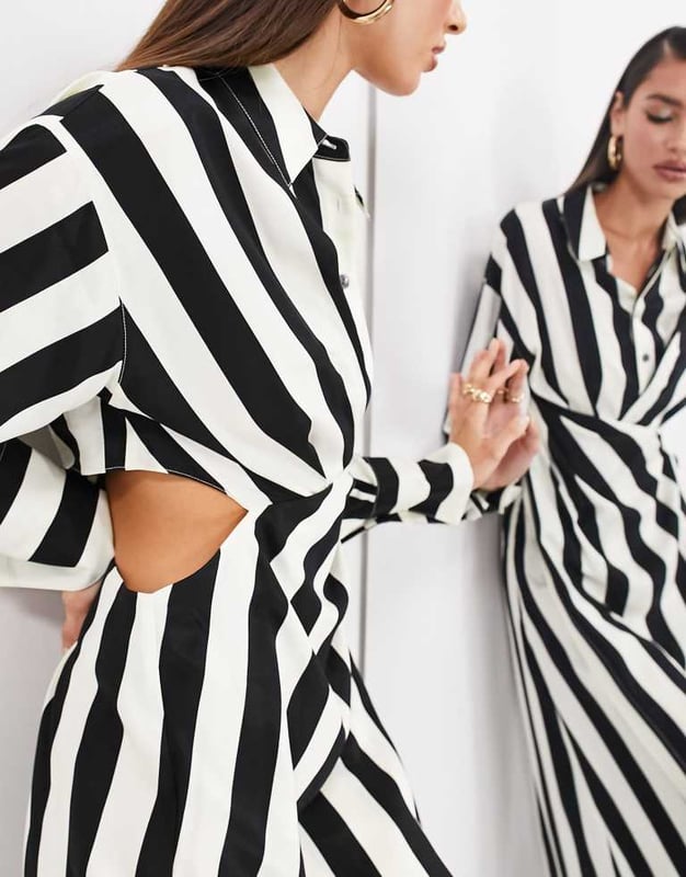 Dresses by ASOS EDITION POV: you have plans Spread collar Partial button placket Cut-out side Wrap skirt Buttoned cuffs Regular fitSold By: Asos