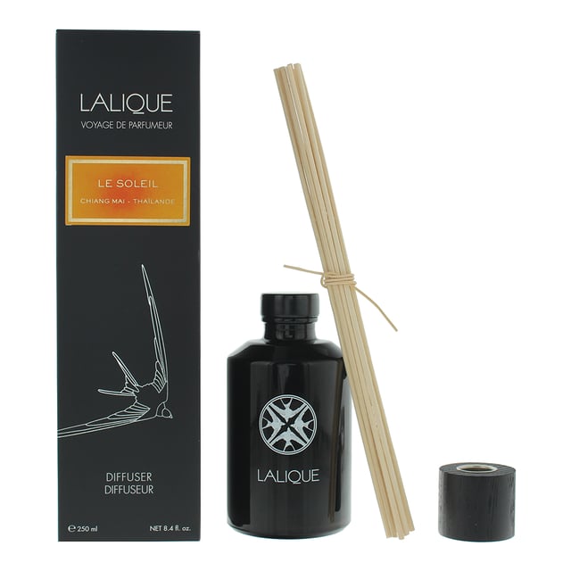 Lalique Le Soleil Chiang Mai Diffuser is a luxurious home fragrance accessory that combines elegance with the artistry of Lalique craftsmanship. This diffuser is designed to infuse your living space with a captivating and long-lasting scent experience.The fragrance, inspired by the vibrant energy of Chiang Mai, is carefully curated to create a sense of sophistication and tranquility. The top notes offer an initial burst of freshness, while the heart notes unfold with a harmonious blend of floral, fruity, or woody accords. The base notes provide a lasting and memorable foundation, ensuring that the fragrance lingers in the air.The diffuser itself is housed in a beautifully crafted Lalique crystal vessel, showcasing the brand's signature attention to detail. Display it in any room to enjoy the exquisite fragrance and elevate the sensory experience in your living space.