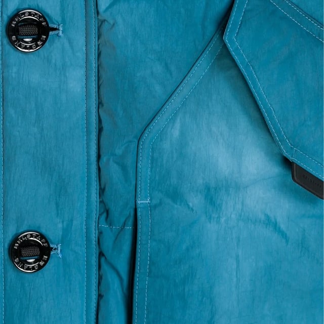 Experience the ultimate in versatility and style with the Belstaff Blue Jacket. This down jacket offers both warmth and fashion-forward design, allowing you to effortlessly transition from a casual day look to a chic evening ensemble. Stay cozy and look amazing with this must-have jacket!, Down Jacket, Material: 100% Polyamide, Filling: 90% White Duck Down, 10% White Duck Feather, 750 Fill Recycled Down Insulation Jacket, Water Repellent, Wind Proof, Made From Recycled Fabric, Zip Closure, Blue Jacket, Blue Coat