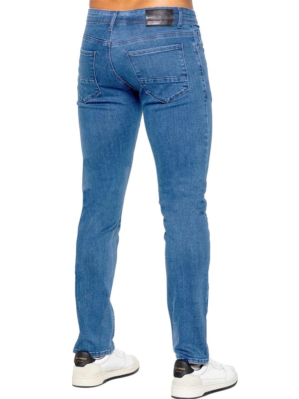 Descubre el máximo confort y estilo con los jeans de pierna recta de ETO, que cuentan con una conveniente bragueta con cremallera, un diseño funcional de 5 bolsillos y botones y remaches de marca distintiva. Prepárate para enfrentar el día con facilidad y confianza con estos jeans cómodos sin esfuerzo.