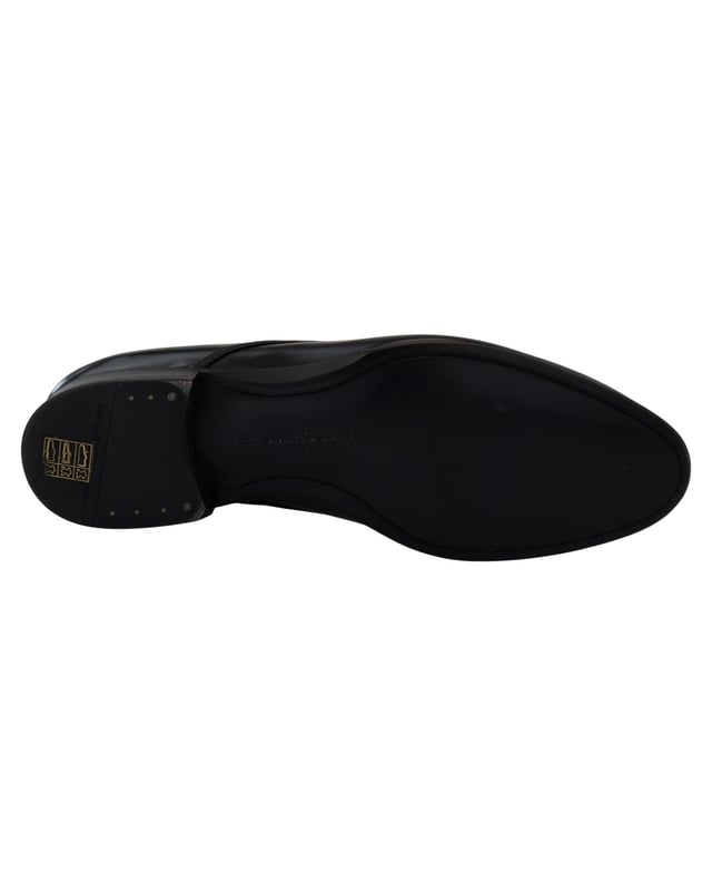 Brand: DOLCE & GABBANA
  Model: Derby dress formal shoes
  Color: Black
  Material: 100% Leather
  Leather sole for added comfort
  Logo details for a stylish touch
  Made in Italy
Material: 100% Leather