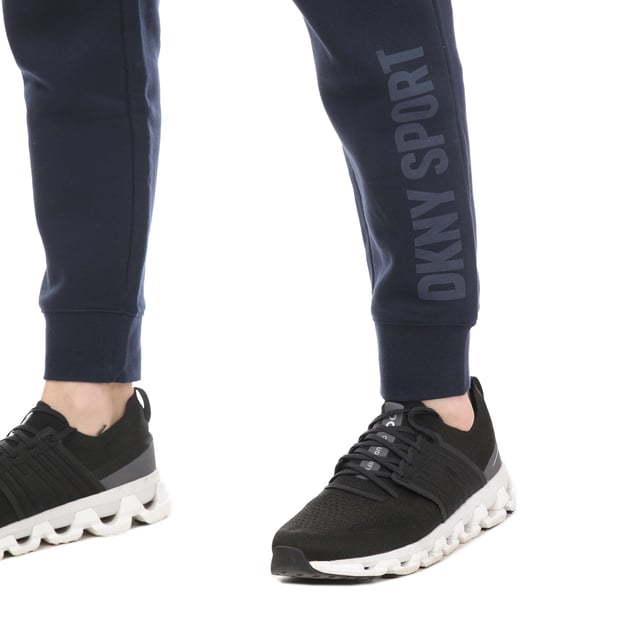 Tonal Logo Fleece Joggers.- Regular fit.- Elastic waist band.- High rise.- 72% cotton  28% polyester.- Ref: SDKD329NAV