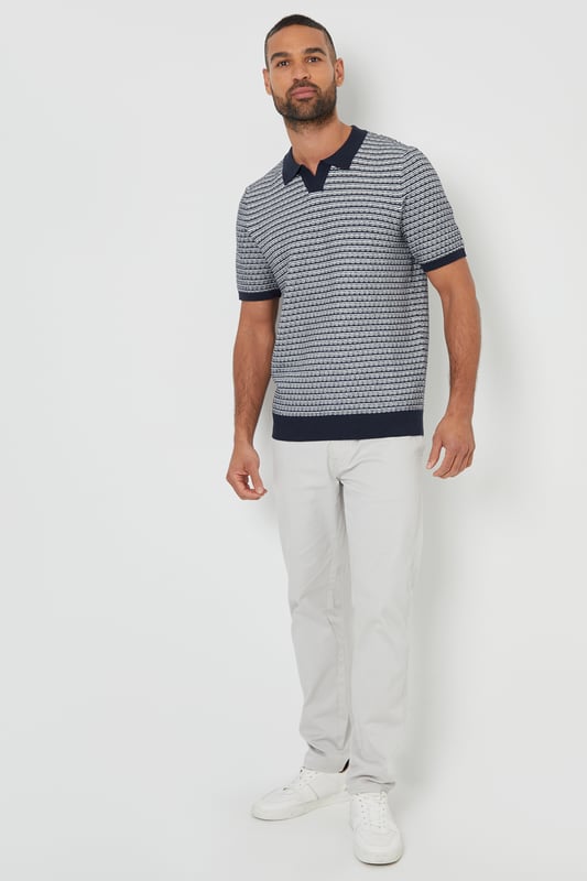 Complete your capsule wardrobe with this striped trophy neck textured knitted polo shirt from Threadbare. Cut in a regular fit, with short sleeves, this polo shirt has a ribbed trophy neck collar and is in an all-over textured stitch knit. With ribbed cuffs and a ribbed hem, and finished with a Threadbare metal tab above the hem for coveted brand recognition. Team with jeans, chinos or shorts for a laidback luxe look that's perfect for smart casual outings and everyday wear.