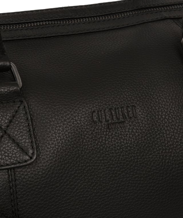 Crafted from natural leather with a supple and ultra-soft feel, the 'Ocean' holdall from Cultured London is the perfect bag for a when travel is on the agenda. The zip-over top secures the main compartment, concealing the 100% natural cotton lining. Two outer zipped pockets provide extra storage solutions, complemented by metal fittings. Comes with matching leather grab handles and an adjustable strap with a drop length of 70cm. Finished with the contemporary embossed Cultured London logo.