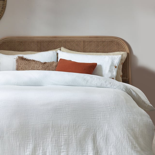 Inspired by timeless classic fabrics, the Lark duvet cover set is made from ultra-soft double-layer muslin cotton fabric. Available in a range of pastel tones, this bedding is complete with a wooden button closure. The cosy crinkle texture is perfect for bringing a relaxed, stylish feel to your bedroom. Cool and breathable in the summer months and snuggly and warm in the winter, muslin is used on both sides for an understated yet modern look. This product is certified by OEKO-TEX®, showing it has been sustainably made.