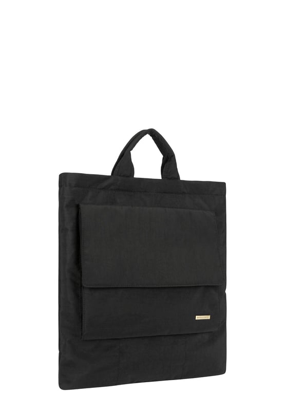 Made from our signature nylon, the Portrait Nylon Tote is the perfect way to carry all your everyday essentials. Featuring a padded carry handle and adjustable crossbody strap with a clip off function. Features: , Zip top opening, Front oversized flap over zip pocket, Rear zip pocket, SMITH & CANOVA antique brass logo, Branded antique brass zips, Padded grab handle, Adjustable crossbody strap (detachable), Internal 15 inch padded laptop sleeve, Internal zip pocket, 2 Internal mobile phone slip pockets - fits normal and plus size smart phones, 2 Internal pen slip pockets Style Ref: 92682 BLACK