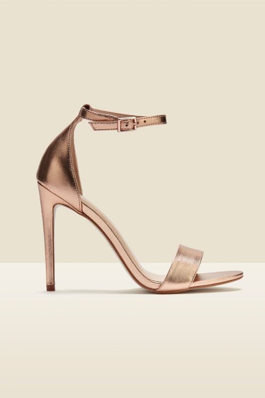 Your go-to going out shoes
Simple but sexy
Luxe gold leather
Ankle strap fastening
Covered heel for extra support
With jeans and a nice top or an LBD