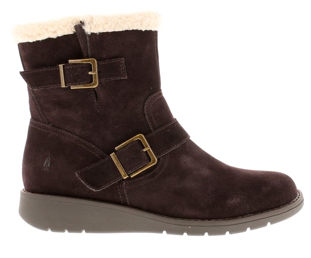 Hush Puppies Lexie Womens Leather Ankle Boots Brown The Lexie Boot; crafted with Worry Free Water Resistant real suede upper with a soft shearling topline enables this to combine trendy and comfort all into one. Its double branded buckle strap detail adds to its chic style.
- Worry Free Water Resistant Real Suede Upper
- Super Warm Shearling Lining
- Cushion Comfort Memory Foam Leather Insole
- Flexible yet Hardwearing TPR Wedge Sole
- Shaft circumference: 28cm