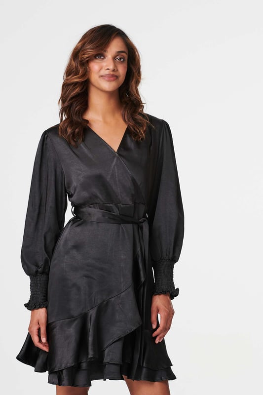 Add a short style to your dress collection with this frill detail wrap dress. It has a V-neck with a wrap front, a detachable self-tie belt, long sleeves with wide shirred cuffs and a frilled layered hem falling just above the knee. Pair with neutral heels for an elegant style that's great for dinner out with friends.