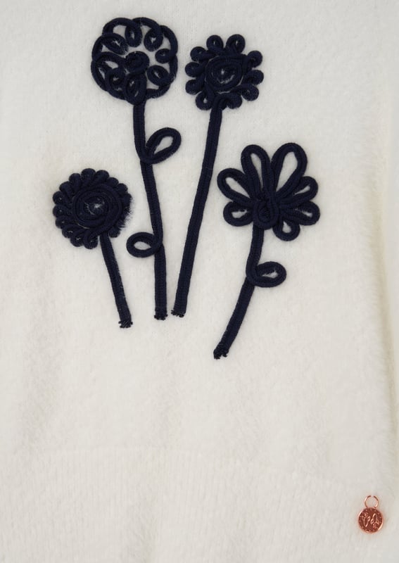 This jumper is like a giant stylish hug! Made from the softest fluffy yarn and adorned with a stylish cornelli bouquet it is the most perfect Spring knit.. About Me: 96% Nylon 4% Cotton Look After Me: Think Planet. Wash At 30C.