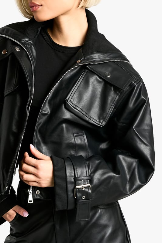 Keep things casual but always on-trend with a piece of outerwear perfection, the bomber jacket. A light jacket featuring a gathered, ribbed waistband and matching cuffs, a bomber jacket is versatile, timeless, and the perfect way to edge up your casual wear. Wear your new women's bomber jacket with a shirt and stripe joggers for the hottest look of the moment: sports luxe, or layer a varsity jacket over a t shirt dress for a fresh new-season look.Style: Bomber JacketFabric: Faux LeatherSleeve Length: Long Sleeve