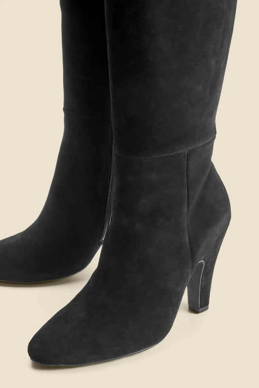 Every wardrobe needs a pair Crafted from butter-soft suede Set on a chunky curved heel for day-to-night comfort Wear-forever knee-high silhouette Slip over skinnies Style with a printed midi dress