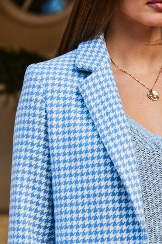 REASONS TO BUY:

Outerwear with wow factor
Forever-on-trend dogtooth check
Longline hem for extra cosiness
Chic collar and covered button front
Effortlessly chic with jeans and a jumper