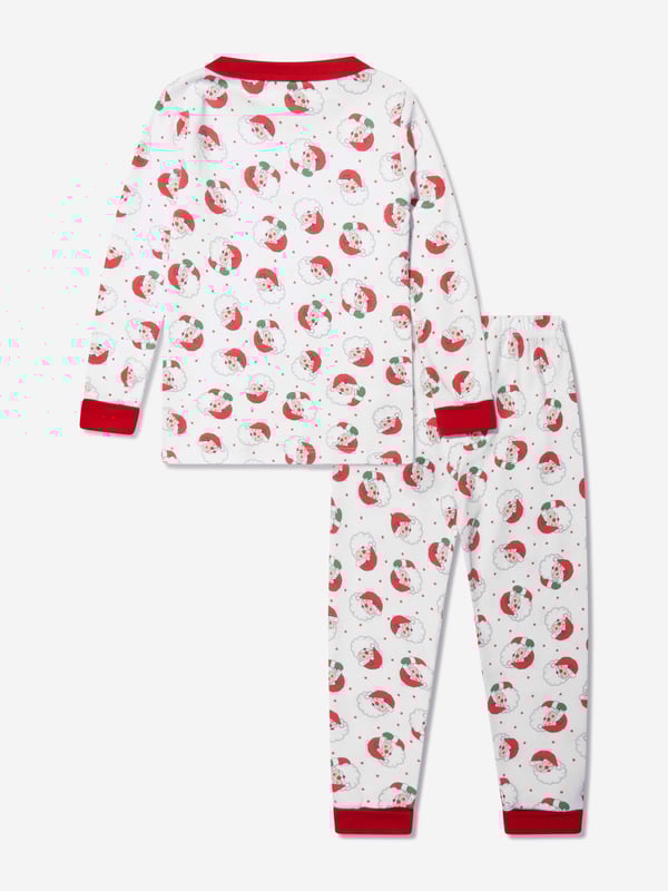Introducing the Kids Winking Santa Long Pyjamas in Red by Magnolia Baby - a whimsical blend of comfort and style in unisex wear! Key features include:  Unique Design: Boasting a playful winking Santa print, adding a charming twist to your child's sleepwear collection.  Premium Comfort: Crafted from top-tier materials, promising ultimate comfort and relaxation for your child's sound sleep.  Versatile Addition: A perfect blend of style and comfort for your unisex wardrobe.Let your child sleep in comfort while radiating style with our Winking Santa Long Pyjamas. Order now!