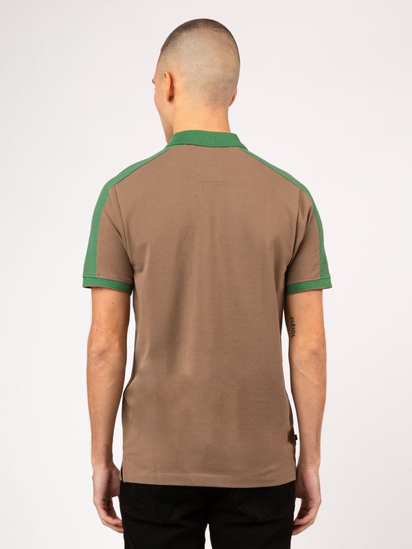 This polo shirt from LUKE is perfect for your everyday line-up. It's crafted from a soft cotton pique and detailed with contrast colour cut and sew overarm panels. It features a classic button placket which has a contrast colour underside and is complete with the brand's iconic lion head embroidery on the left chest. Iconic LUKE BLACK, GOLD, RED lion head embroidery. Iconic LUKE tri-colour trim tape. LUKE buttons. Contrast colour underside of collar. Rib collar and cuff. Single contrast cuff tipping. Contrast cut and sew overarm panels. Marina red top button..