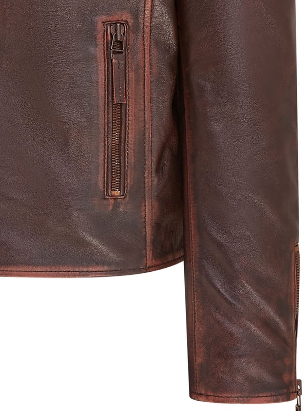 The centrepiece of a timeless look, this jacket is crafted with full grain nappa leather to achieve a slim fit stylish biker silhouette. Eye catching additions to this piece include ribbed detailing on the shoulders and a traditional wide collar. The front of the jacket is accented with a double zip and features a slanted zip pocket across the breast as well as a further two zip pockets. This jacket comes in a range of colours to suit a variety of tastes, allowing all to find their ideal style in this classic Brando style piece.

• 100% premium ultra-soft nappa leather.
• Slanted zip breast pocket • Double zip front, tagged for ease of use
• Wide notch stud fastened lapels
• Pockets integrated into the jacket lining
• Ribbed detailing on the shoulders
• Stylish zipped cuffs