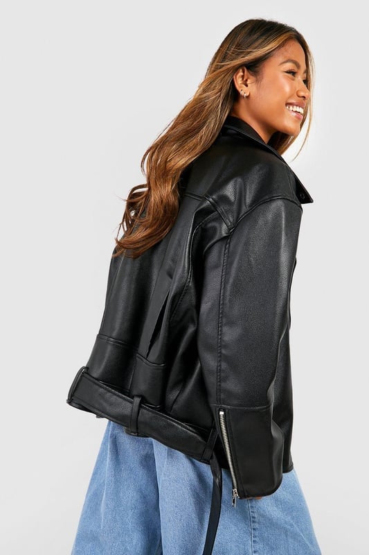 A short, close-fitting jacket complete with zips and stud detailing, rock some seriously cool vibes on the day-to-day with a biker jacket. Whether you prefer cropped, longline or a classic oversized shape for vintage vibes, biker jackets are a wardrobe classic that's perfect for edging up your outfit. Layer up your dress with a suede biker jacket, or show off your shape with a black biker jacket that's both timeless and flattering.Style: Faux Leather JacketFabric: Faux LeatherLength: LonglineSleeve Length: Long Sleeve