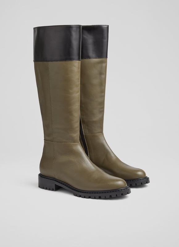 LK Bennett Lincoln Knee Boots, Army Green A knee-high boot with a biker feel, our Lincoln flat boots are a brand-new style in our autumn/winter collection. Crafted in Italy from super-soft army green calf leather, they have a round toe, a contrast border in black, an inside zip and a rugged, chunky flat sole. Wear them to dress down winter dresses or with jeans on more casual days.