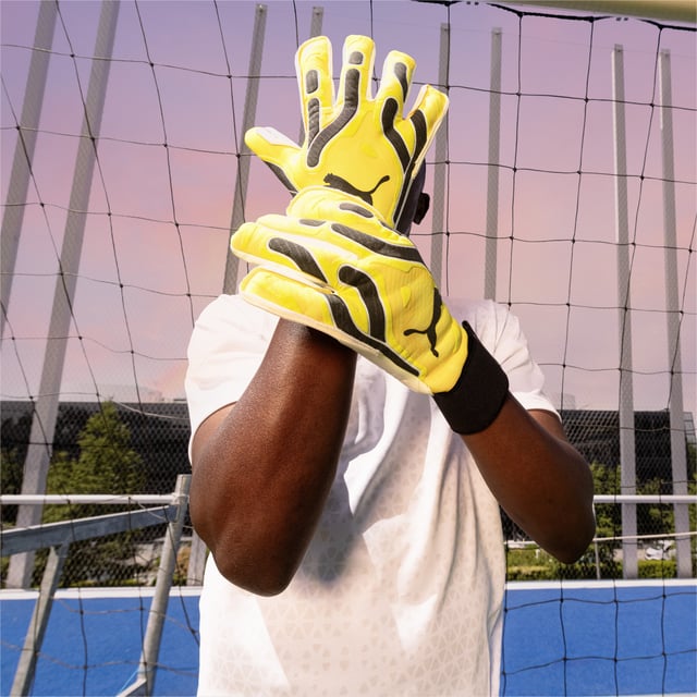 PRODUCT STORY: The new ULTRA ULTIMATE HYBRID goalkeeper gloves are designed to meet every need of the modern keeper. Featuring a lightweight fabric and in using the exclusive GRDXKN print technology, the glove is extremely lightweight and flexible. With the newly designed backhand, each section has a specific treatment to improve the performance of grip, cushioning and ball control, no matter the conditions. DETAILS: 4mm Superior grip latex palm made of renewable raw materials provides fantastic grip in both wet and dry conditions; Gunn/Negative-mixed palm cut provides additional grip and improved fit; Weight-reduced body material allows perfect agility and enhance breathability; Printed backhand using the exclusive GRDXKN print technology provides grip and additional support when punching the ball; Thumb wrap increased latex to ball contact; Elasticated wrist with full length latex strap provides wrist support and a secure closure.
