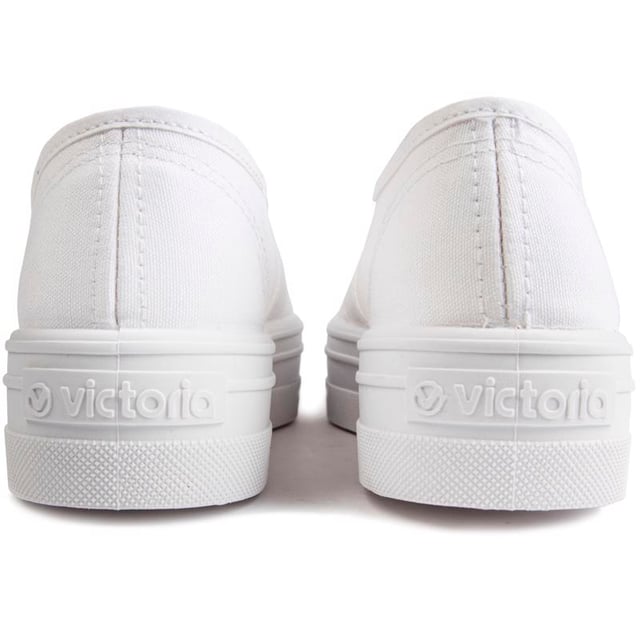 Bring Some Life And A Little Retro Vibe Into Your Trainer Collection, With The Women's Platform Plimsole From Victoria. Crafted From Strong Canvas, The Stylish All-in-white Trainers Are Finished With A Vulcanised Rubber Sole And Metal Eyelets.