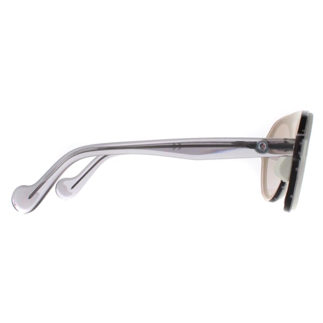 Moncler Round Unisex White Transparent Grey Grey ML0052  Sunglasses are a modern round style featuring a top bar for added comfort. The lightweight acetate frame features the Moncler logo on the temples for brand recognition.