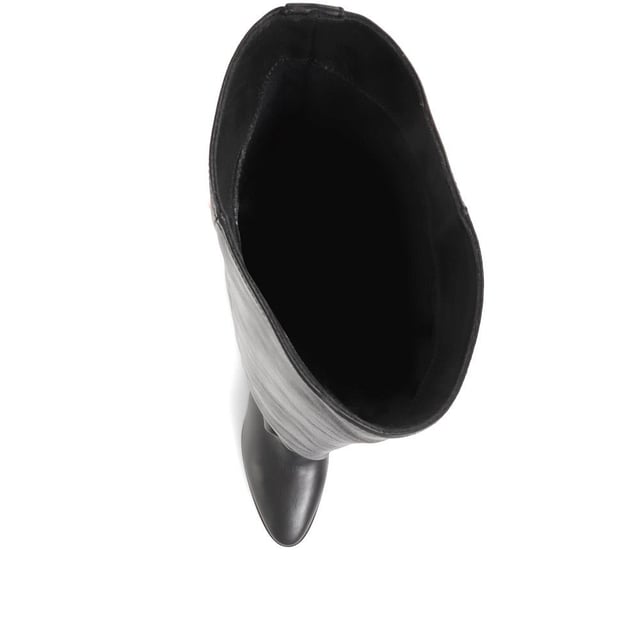 Our Lilyana over the knee boots embody elegance and effortless glamour. Crafted from soft, glossy leathers, Lilyana is poised on a stacked heel and imagined with a striking pointed toe. Fully leather lined for a comfortable fit, this pull-on silhouette offers instantaneous wear. Wear with confidence, style Lilyana with skinny jeans or a mini skirt to switch up your regular rotations.