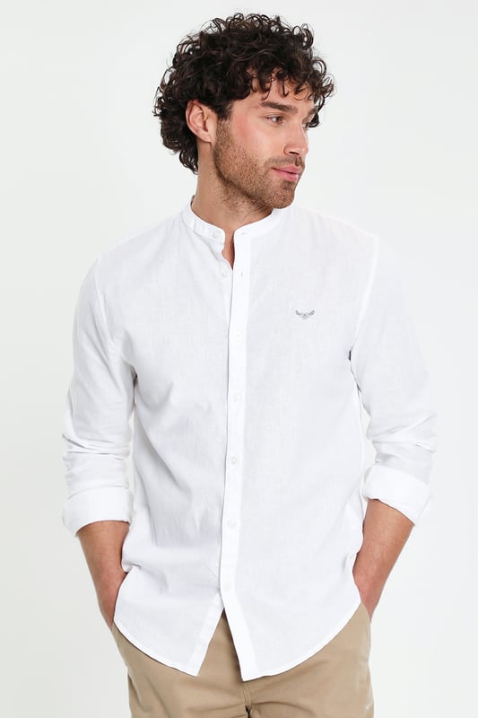 Update your wardrobe with this grandad collar, long-sleeve shirt from Threadbare. Designed in a regular fit with button fastening and button cuffs, this shirt is made in a breathable linen and cotton blend fabric. Style with jeans or chinos to complete the look. Other colours and boy's version available.