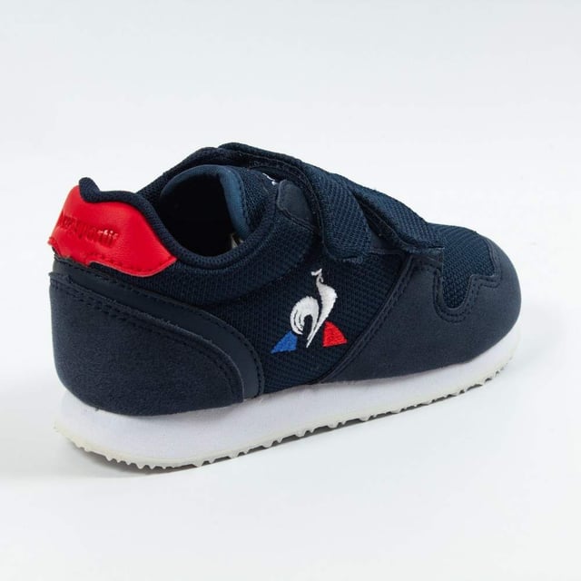 Basket Le Coq Sportif Jazy Inf Jungen Blau Textil. Authentischer Schuh von der Marke Le Coq Sportif - Streetwear/Sportswear Design von Le Coq Sportif - Le Coq Sportif für modebewusste Jungen, perfekt für den Alltag - Der blaue Basket Le Coq Sportif lässt sich ideal mit dem Rest deiner Garderobe kombinieren - Bequemes Textilmaterial - Klassischer Klettverschluss - Jazy Inf - Textil