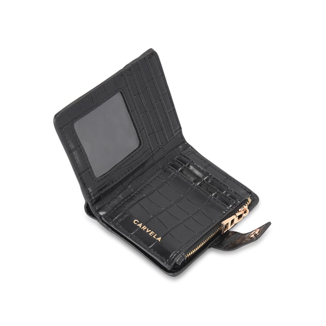The Carvela Mandy Purse features a black croc embossed exterior. There is a gold tone Carvela branding on the front and pop closure. Can fit classic credit cards. Dimensions: 9cm (H), 12cm (L), 3cm (D).