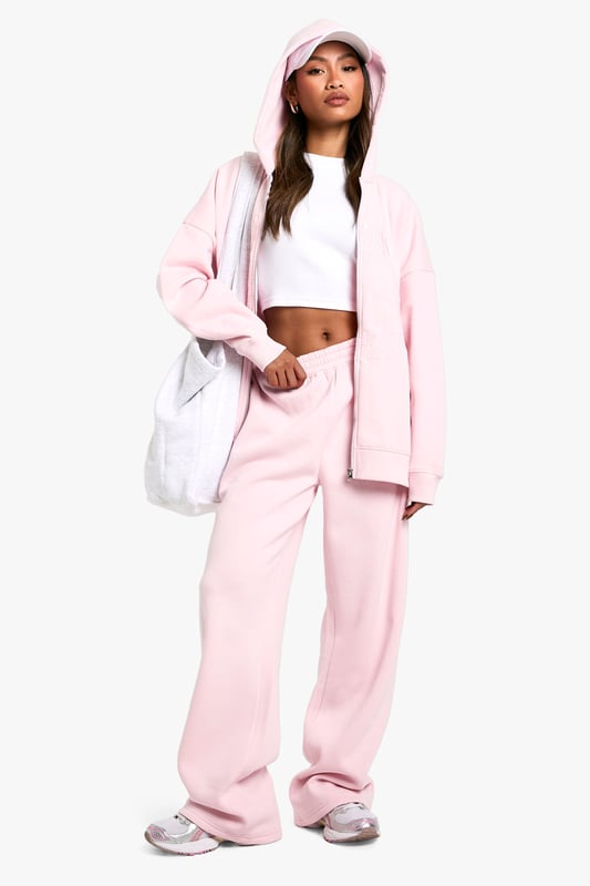 Straight-leg joggers for a modern, relaxed silhouette
        Cosy hood for added warmth and style
        Coordinating set with matching hoodie for a cohesive look
        Versatile design suitable for various casual occasions
        Comfortable fit ideal for all-day wear
    
    Embrace laid-back chic with these straight-leg joggers from Boohoo. Perfect for the fashion-forward woman in her early to mid-20s, these joggers offer a fresh take on casual wear. The straight-leg design provides a contemporary twist on traditional joggers, creating a sleek silhouette that's both comfortable and stylish. Pair with the matching hoodie for a coordinated ensemble that's perfect for casual outings, family gatherings, or relaxed weekends at home. Style with trendy trainers and a cropped top for a youthful, street-style inspired look, or dress up with a fitted bodysuit and statement jewellery for a night out with friends. These versatile joggers are a must-have addition to any casual wardrobe, offering endless styling possibilities for the social butterfly who values both fashion and comfort.