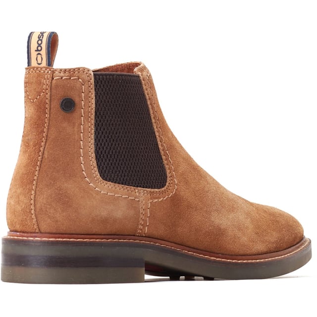 Base London Portland Leather Men's Ginger Boots The Portland Chelsea Boot by Base London is crafted with premium leather uppers, a robust nylon pull tab, and elasticated gusset for easy wear. The cushioned Ortholite insole ensures comfort, while the thick rubber studded sole adds a rugged touch.
