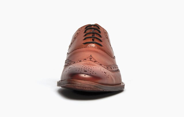 A wardrobe staple, these Catesby England Remington mens brogues are sure to elevate your smart-casual attire. The premium leather upper features classic punch hole detailing and intricate designer stitching, all in an on-trend colourway designed to impress. A slimline outsole completes the look and ensures sophisticated looks and increased traction. 
 - Leather upper
 - Classic brogue detailing throughout
 - Lace up fastening for a secure fit
 - Sturdy rubber outsole
 - Catesby England branding