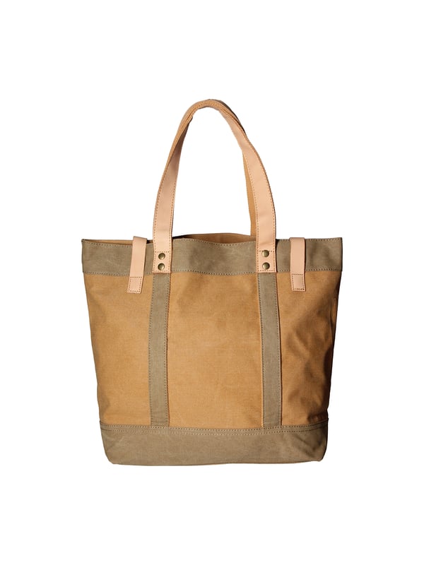 Bolso de mano de mujer de un compartimento en lona y piel genuina. Producto artesanal