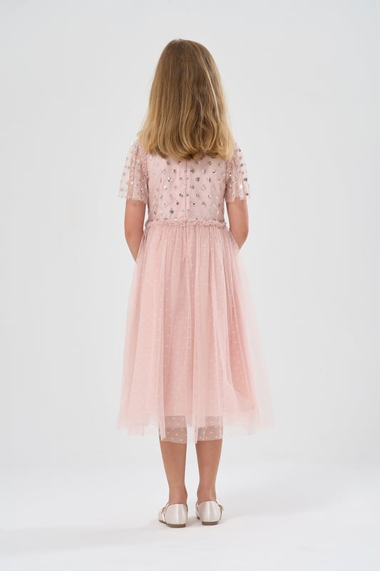 Sparkle and shine in the Luna Moon by Miss waterfall capped sleeve sequin dress! Perfect for special occasions, this enchanting dress features cascading sequins and a graceful waterfall design. Your little one will dazzle with every step.