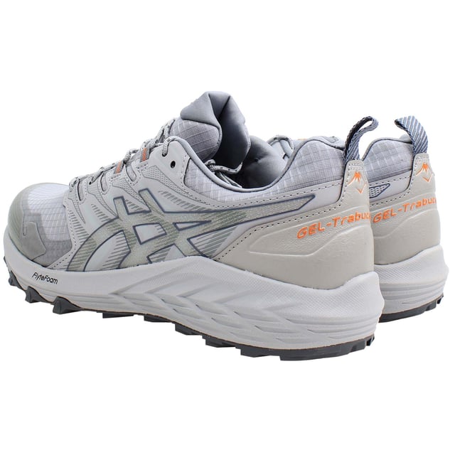 The Asics Gel-Trabuco Terra SPS Men's Grey Trainers are designed to tackle the toughest trails while providing exceptional comfort and stability. Combining advanced technology with rugged durability, these trainers are perfect for trail runners and outdoor enthusiasts who need reliable performance on uneven surfaces. The grey colorway offers a versatile and understated look, making these trainers suitable for both adventurous outings and everyday wear.
 
Key Features:
GEL™ Technology Cushioning:


Rearfoot and Forefoot GEL™: The GEL™ technology in the rearfoot and forefoot areas absorbs shock and provides excellent cushioning, helping to reduce impact and enhance comfort on rough terrains.


FlyteFoam™ Propel Midsole:


Responsive Cushioning: The FlyteFoam™ Propel midsole delivers lightweight and responsive cushioning, offering a springy feel and improved energy return with every step.


Aggressive Traction Outsole:


Multi-Directional Lugs: The outsole features multi-directional lugs that provide superior grip and traction on various trail surfaces, including mud, rocks, and uneven ground.


Dynamic Support System:


TRUSSTIC™ System: The TRUSSTIC™ system enhances stability by reinforcing the midfoot area, reducing the risk of injuries and improving overall balance during dynamic movements.


Durable Upper Construction:


Synthetic and Mesh Materials: The upper combines synthetic materials with mesh panels for durability and breathability, ensuring your feet stay cool and protected on long runs.


Rock Protection Plate:


Enhanced Protection: A rock protection plate in the midsole guards against sharp objects and debris, adding an extra layer of safety and comfort on rugged trails.


Padded Collar and Tongue:


Added Comfort: The padded collar and tongue provide a snug fit and extra cushioning around the ankle, enhancing comfort during extended wear.


Ortholite™ X-40 Sockliner:


Additional Cushioning: The Ortholite™ X-40 sockliner offers superior cushioning and moisture-wicking properties, keeping your feet comfortable and dry.


 
The Asics Gel-Trabuco Terra SPS Men's Grey Trainers are ideal for trail runners and outdoor enthusiasts seeking a balance of cushioning, durability, and traction. With their advanced technologies and rugged design, these trainers are built to handle challenging terrains while providing the comfort and support needed for a confident and enjoyable run.