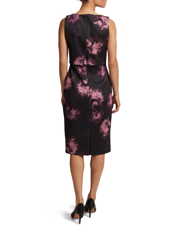 Embrace elegance with the Arianne Scuba Dress. Perfect for evenings, its fitted design flatters with a beautiful floral pattern.
